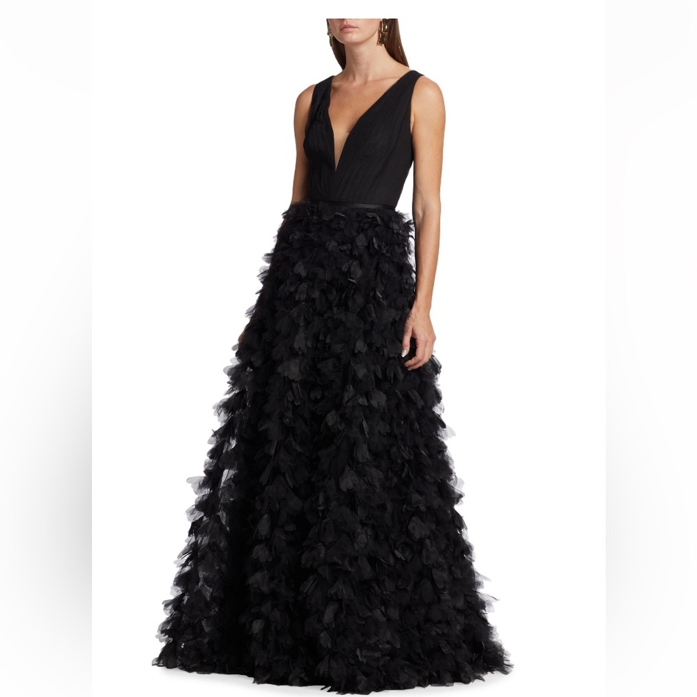 Marchesa's sleeveless gown with a pleated bodice and appliqué detail at skirt.